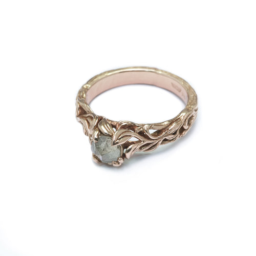 Art Nouveau inspired hand-carved rose gold with raw diamond