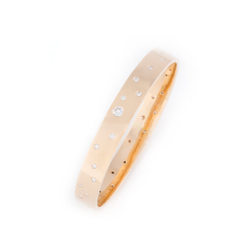 Gypsy Set Diamonds set in a Gold Bangle
