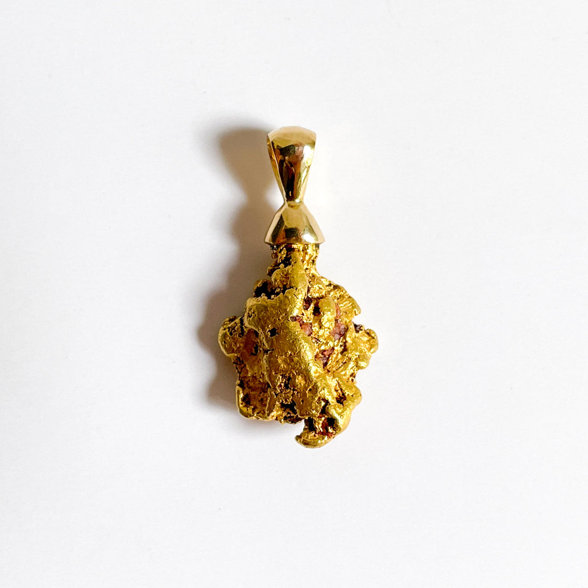 Solid gold nugget deals pendant