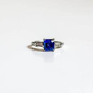 The Modern Diana: White Gold Blue Sapphire and Baguette Diamond Ring