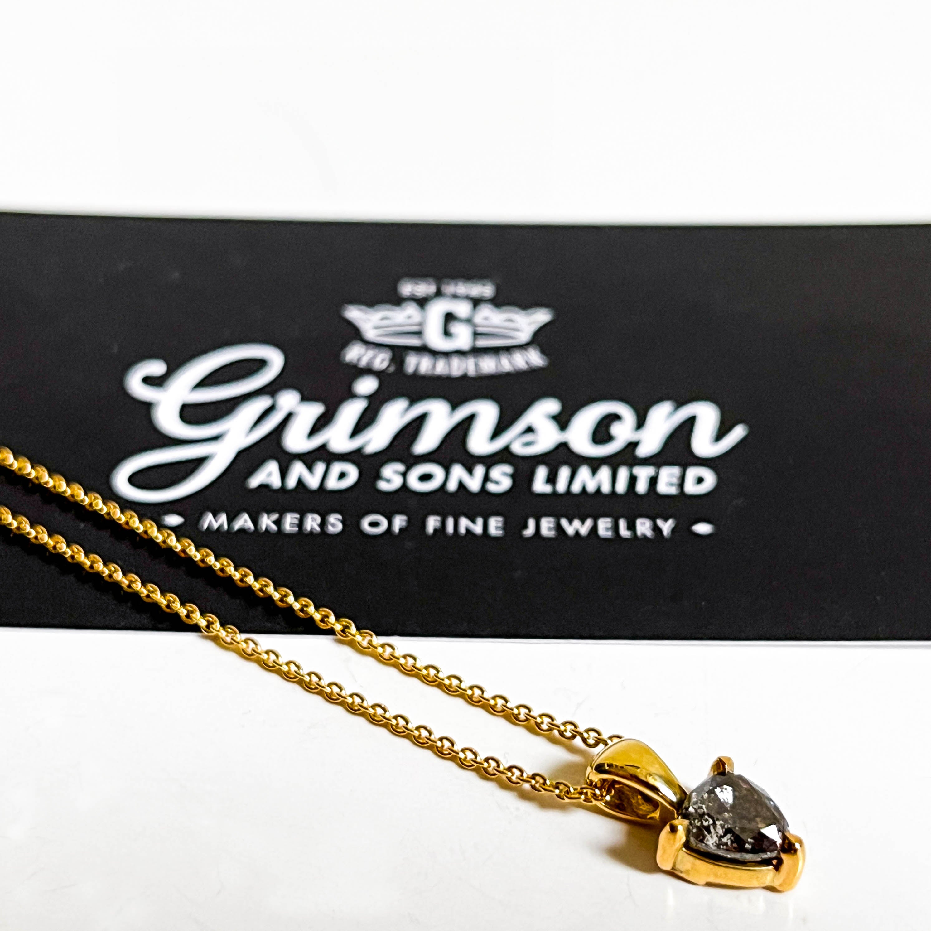 REVEL: YELLOW GOLD TRILLION CUT SALT & PEPPER DIAMOND NECKLACE
