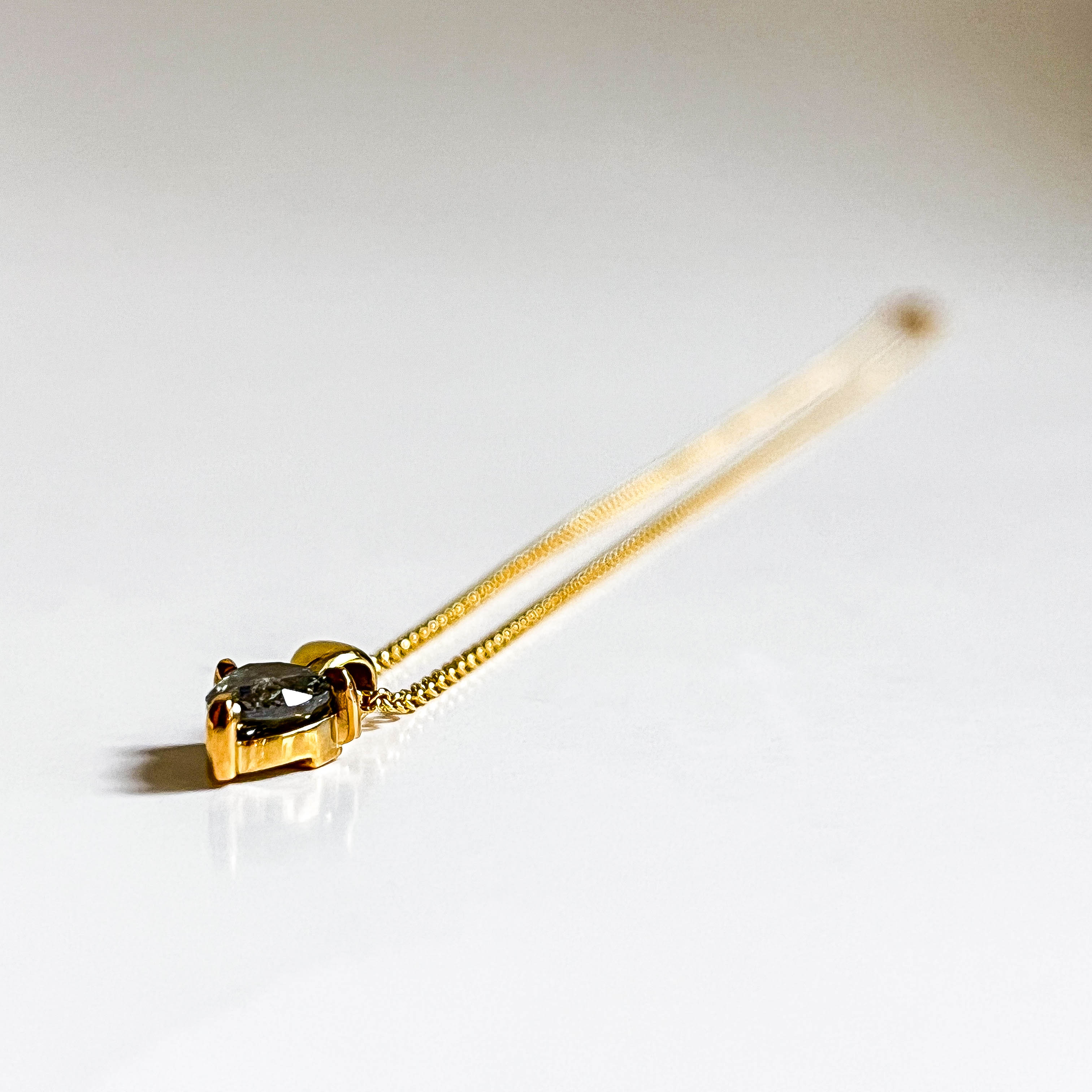 REVEL: YELLOW GOLD TRILLION CUT SALT & PEPPER DIAMOND NECKLACE