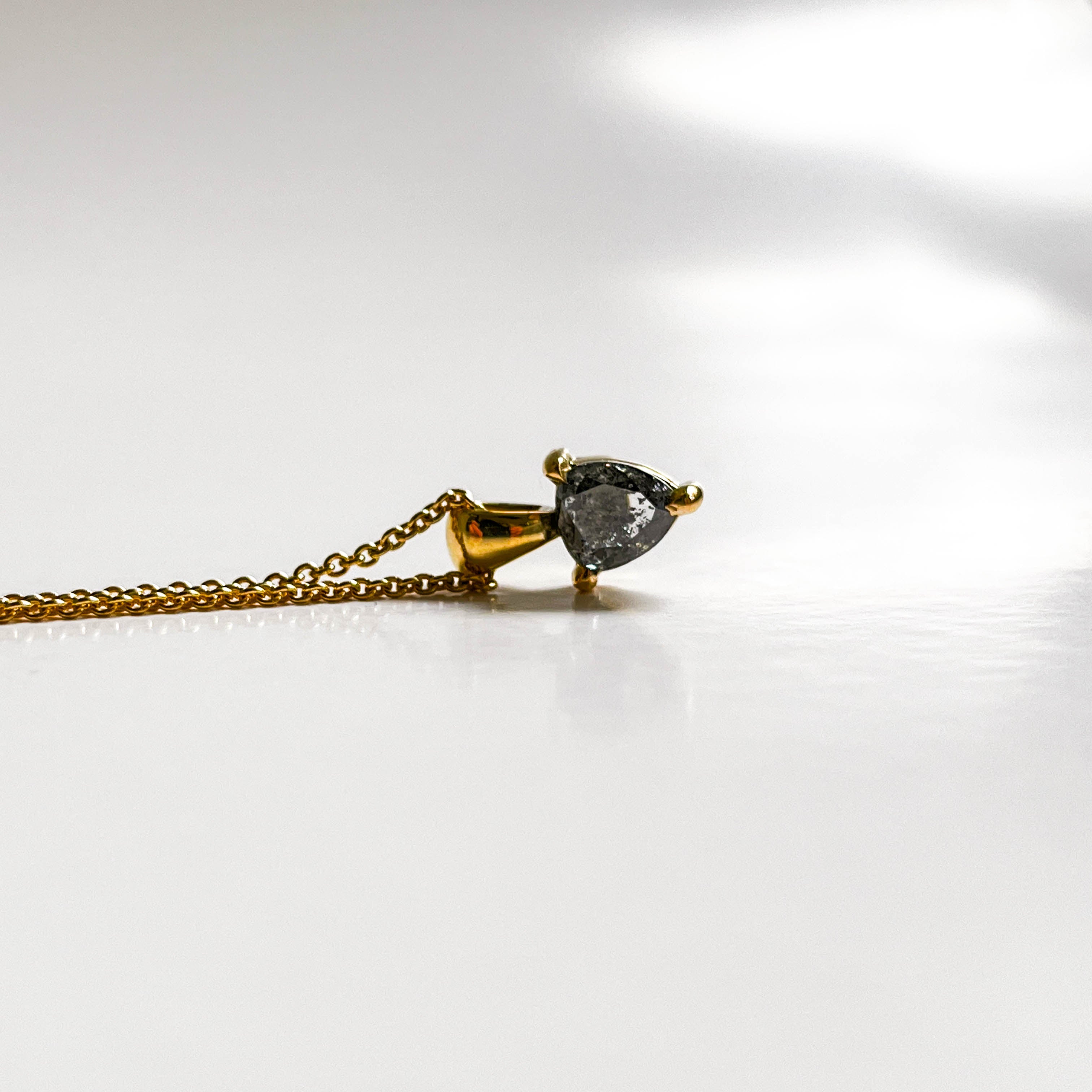 REVEL: YELLOW GOLD TRILLION CUT SALT & PEPPER DIAMOND NECKLACE