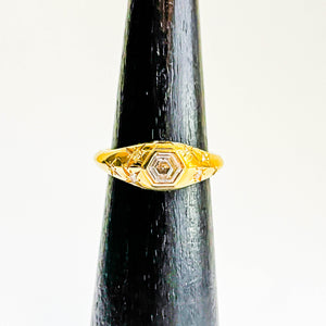 SHOOTING STARS: YELLOW GOLD BEZEL SET HEXAGONAL STEP CUT DIAMOND RING